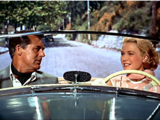 Cary Grant en Grace Kelly in open car